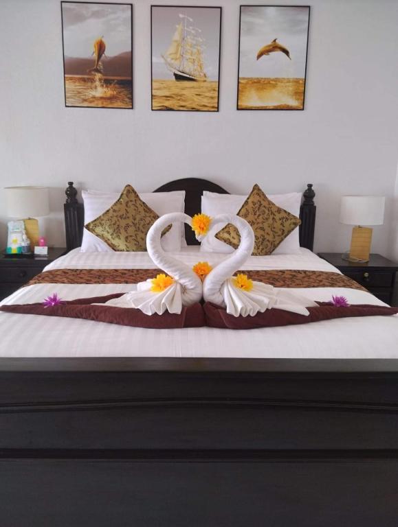 Postel nebo postele na pokoji v ubytování Beach Home Lanta