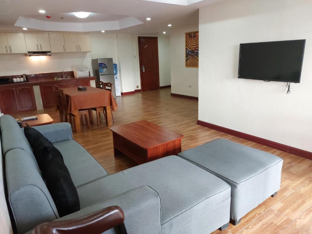 TV a/nebo společenská místnost v ubytování 456 Hotel