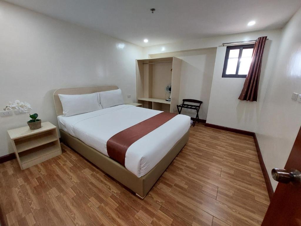 Postel nebo postele na pokoji v ubytování 456 Hotel