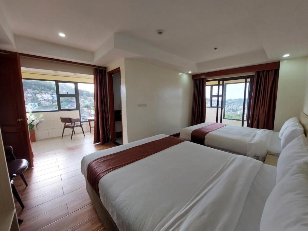 Postel nebo postele na pokoji v ubytování 456 Hotel
