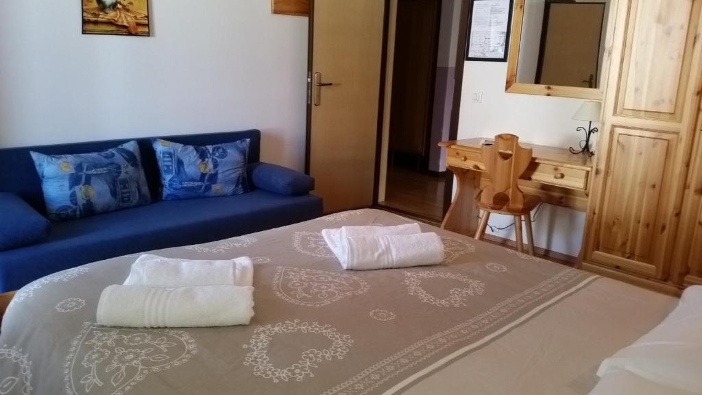 Postel nebo postele na pokoji v ubytování Albergo Bellavista