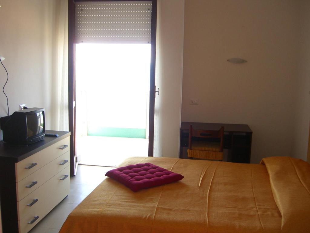Postel nebo postele na pokoji v ubytování Hotel Flaminio