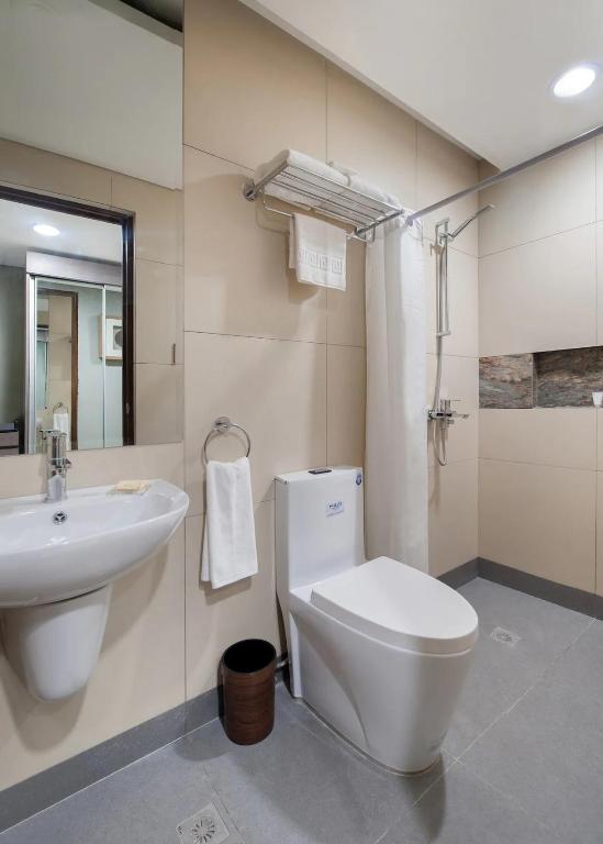 Koupelna v ubytování Solace Hotel