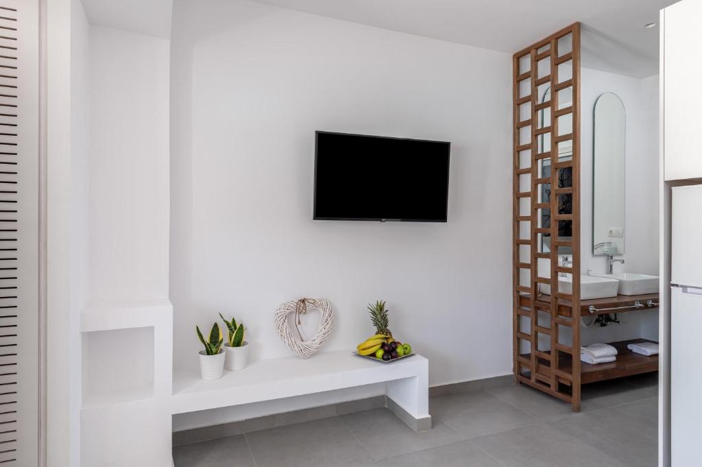 TV a/nebo společenská místnost v ubytování Kellys Luxury Apartments
