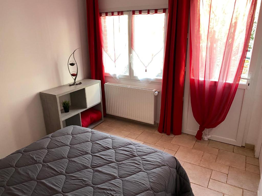 Postel nebo postele na pokoji v ubytování Le Beauvaisis