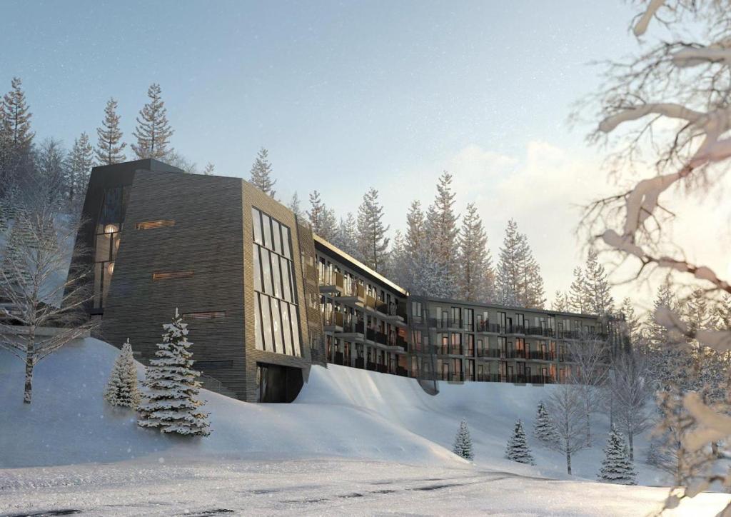 a rendering of a building in the snow at Basecamp Narvik in Narvik