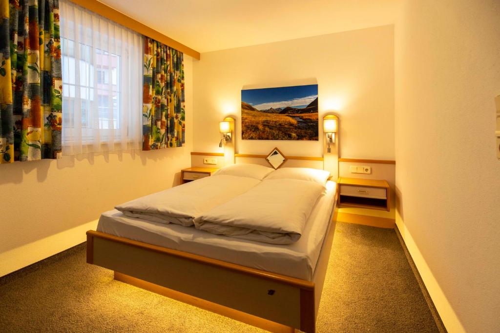 Postel nebo postele na pokoji v ubytování Gidis Hof