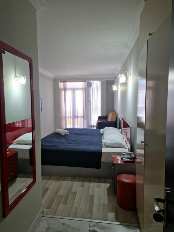 Postel nebo postele na pokoji v ubytování Panorama Hotel Batumi