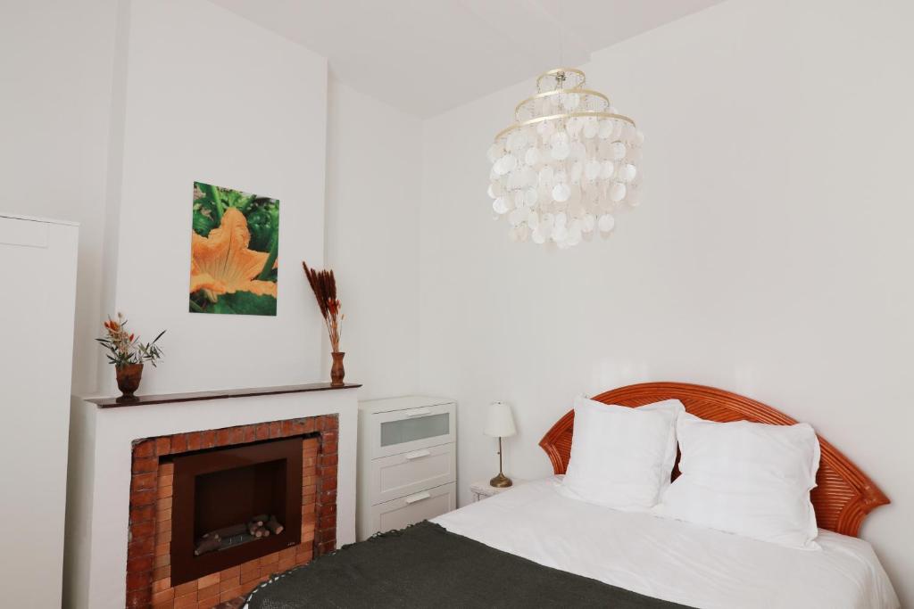 Posteľ alebo postele v izbe v ubytovaní Appartements à la ferme