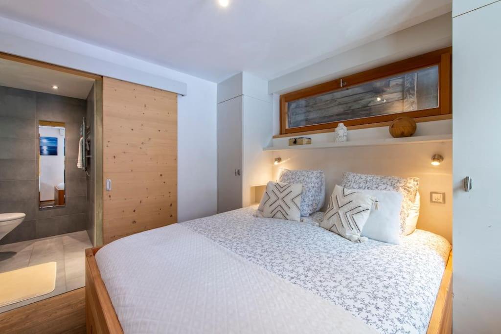 Postel nebo postele na pokoji v ubytování Luxurious Chalet in Verbier