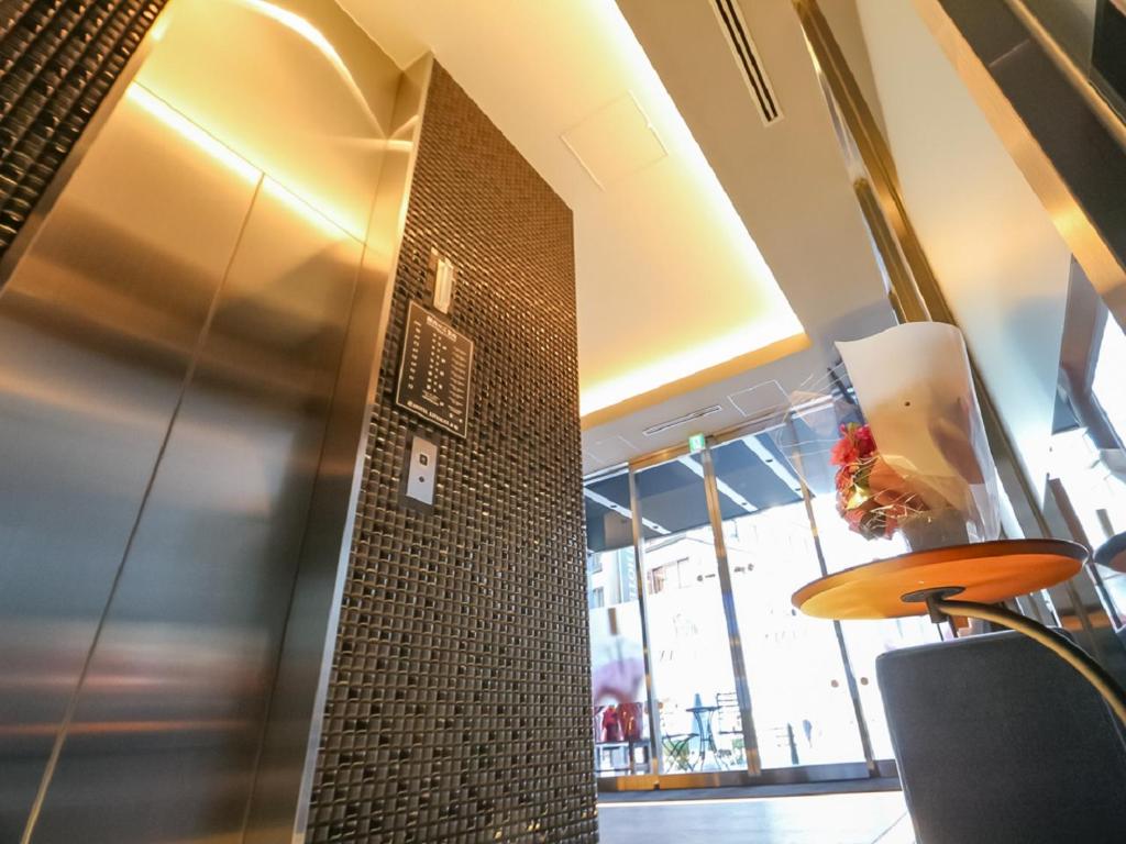 Kuchyň nebo kuchyňský kout v ubytování HOTEL LiVEMAX Akasaka