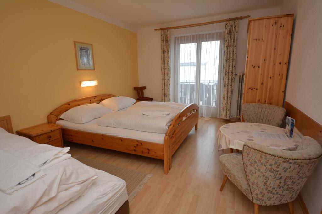 Postel nebo postele na pokoji v ubytování Haus Kleineisen by Châtel Reizen