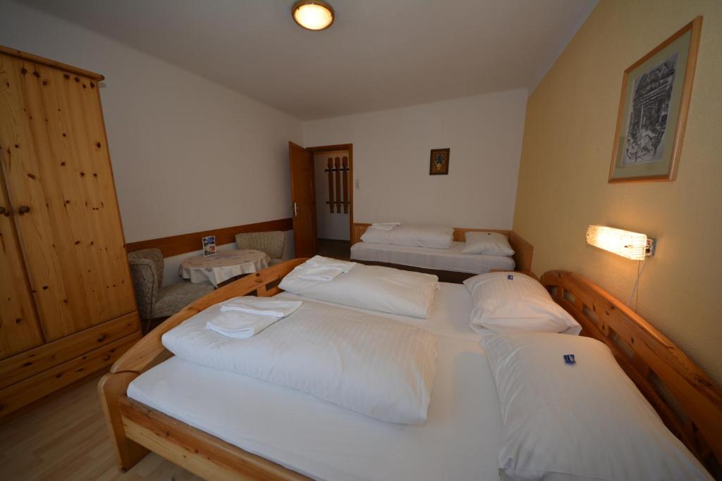 Postel nebo postele na pokoji v ubytování Haus Kleineisen by Châtel Reizen