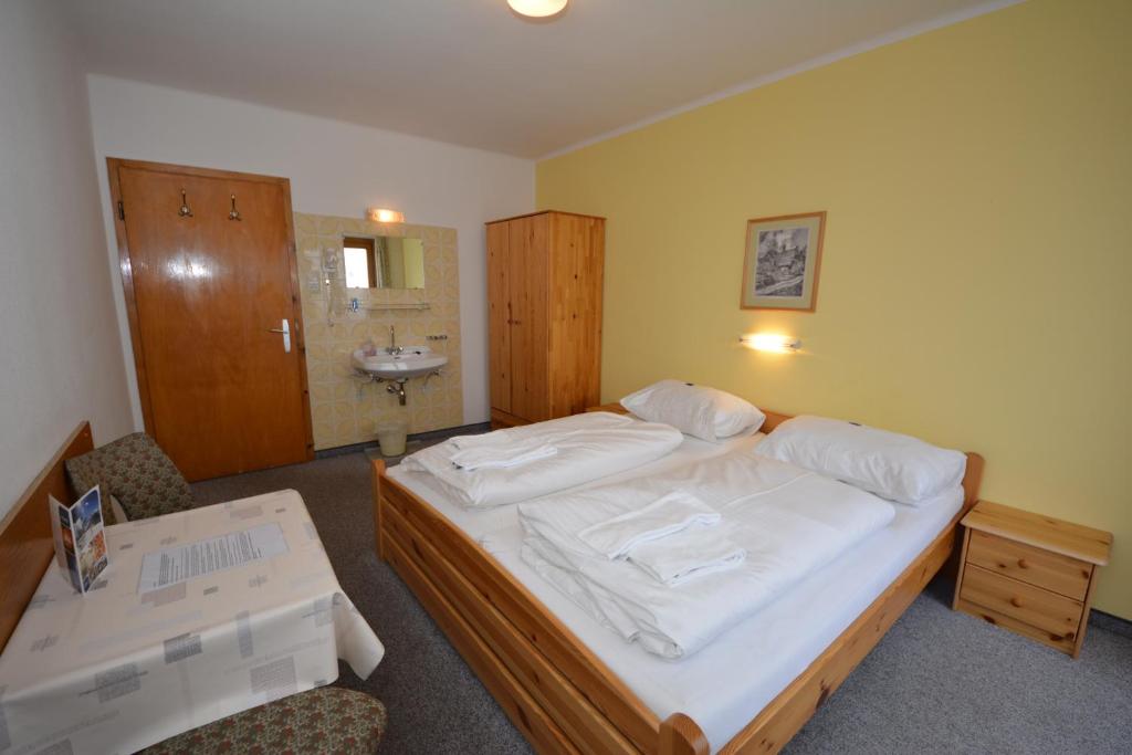 Postel nebo postele na pokoji v ubytování Haus Kleineisen by Châtel Reizen