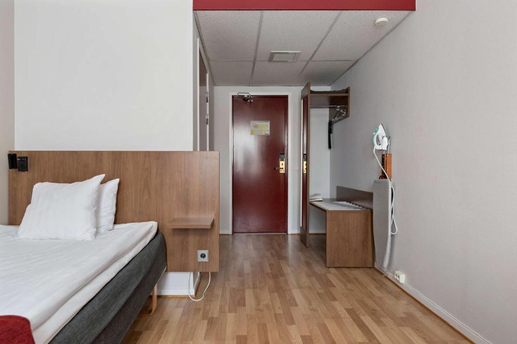Postel nebo postele na pokoji v ubytování Best Western Hotel Statt Katrineholm
