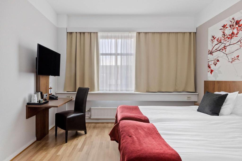 TV a/nebo společenská místnost v ubytování Best Western Hotel Statt Katrineholm