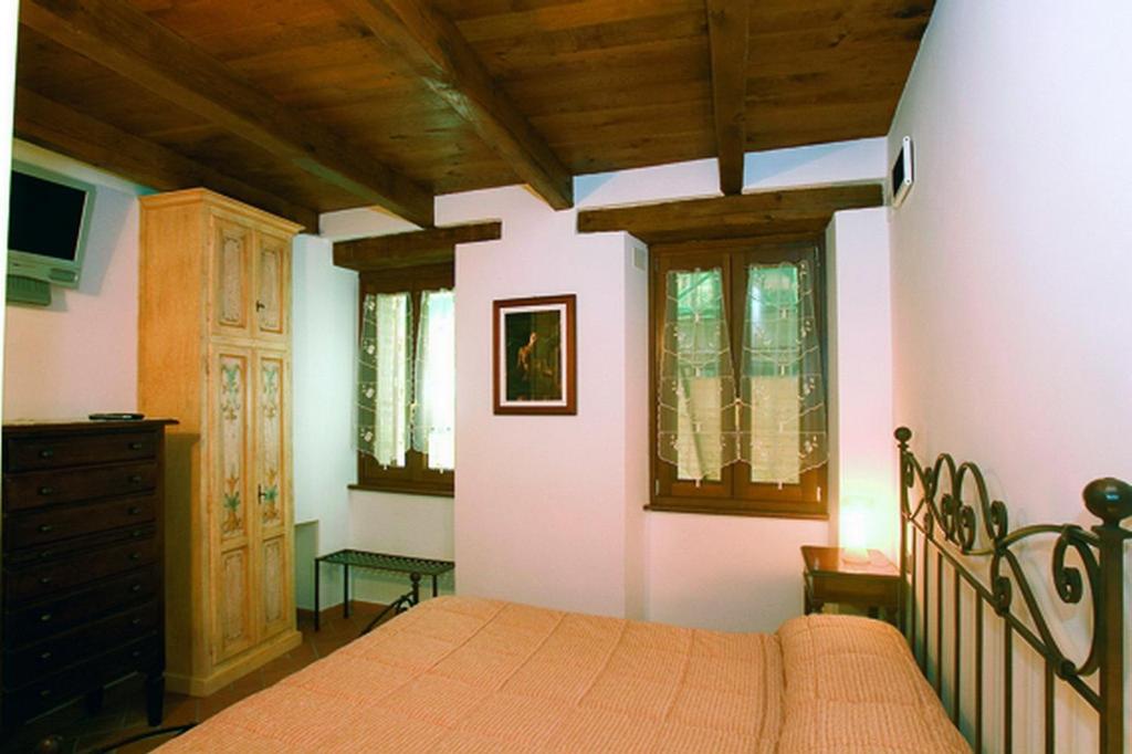Posteľ alebo postele v izbe v ubytovaní B&B La Torretta sul Borgo