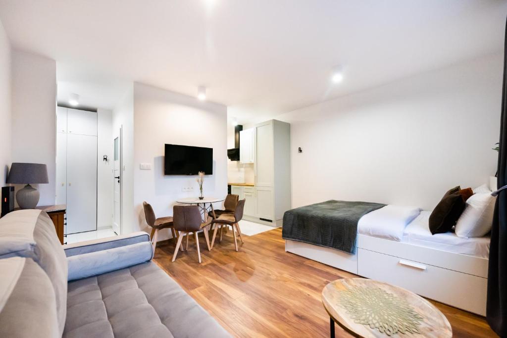 Televízia a/alebo spoločenská miestnosť v ubytovaní Żoliborz Elite Apartment