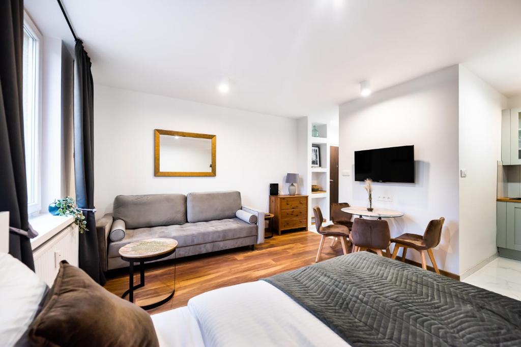Televízia a/alebo spoločenská miestnosť v ubytovaní Żoliborz Elite Apartment