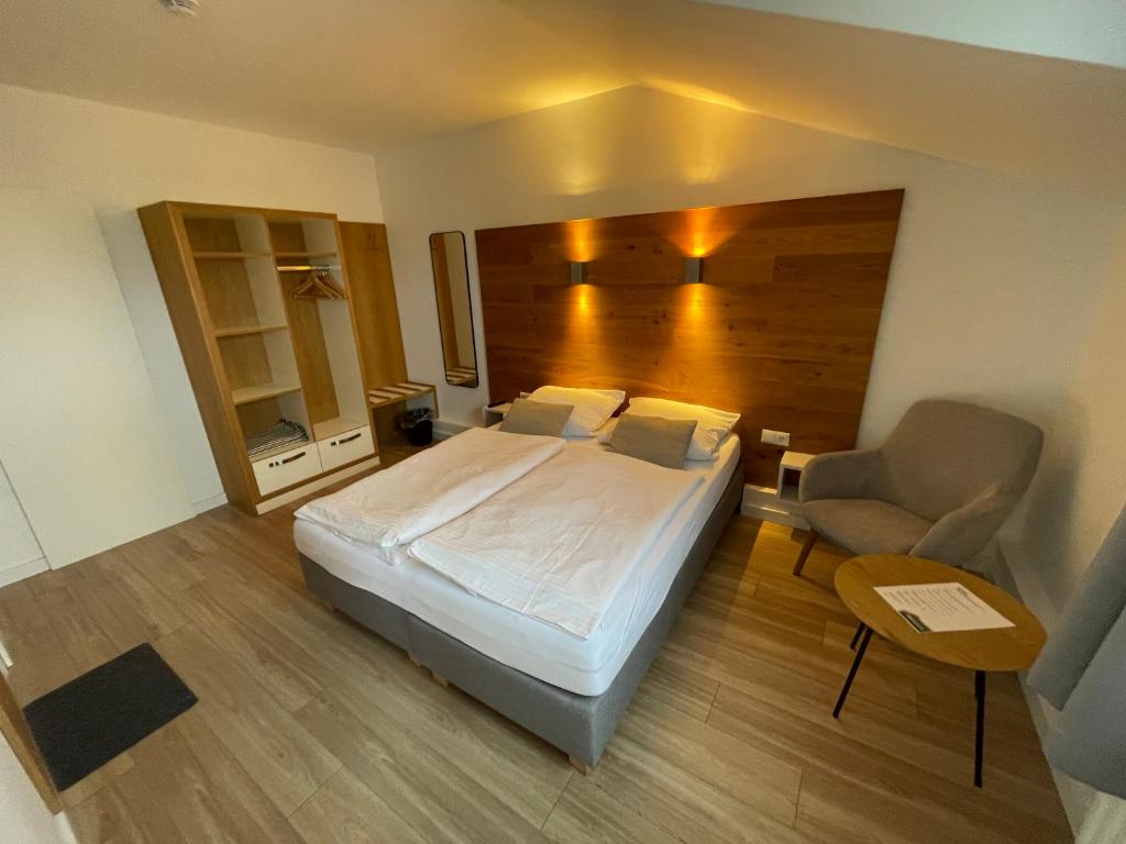 Postel nebo postele na pokoji v ubytování ApartHotel Stadtpark