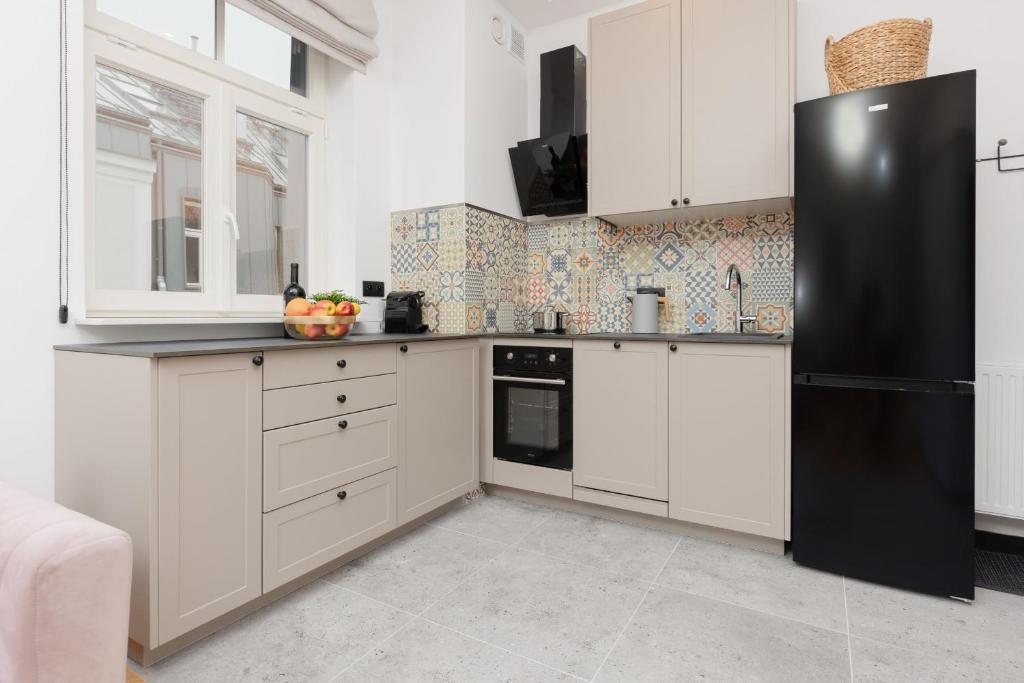Kuchyňa alebo kuchynka v ubytovaní Praga Duplex Apartment Premium Warsaw by Renters Prestige