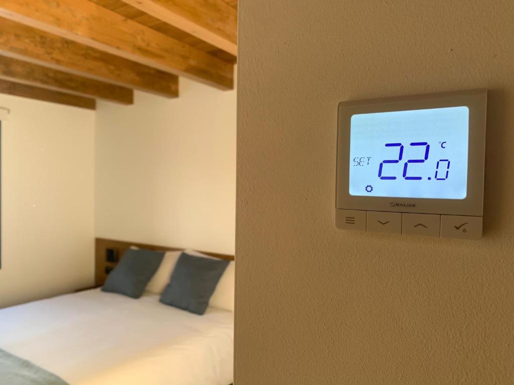 Postel nebo postele na pokoji v ubytování Cal Rufiandis