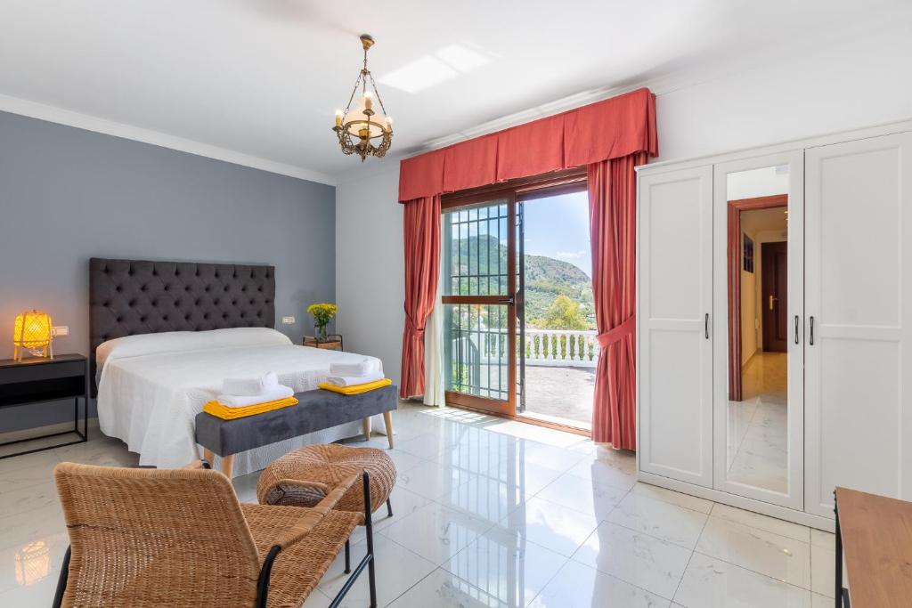 Posteľ alebo postele v izbe v ubytovaní Finca Puerto Ermita - Cerca Málaga 20KM - Pizarra