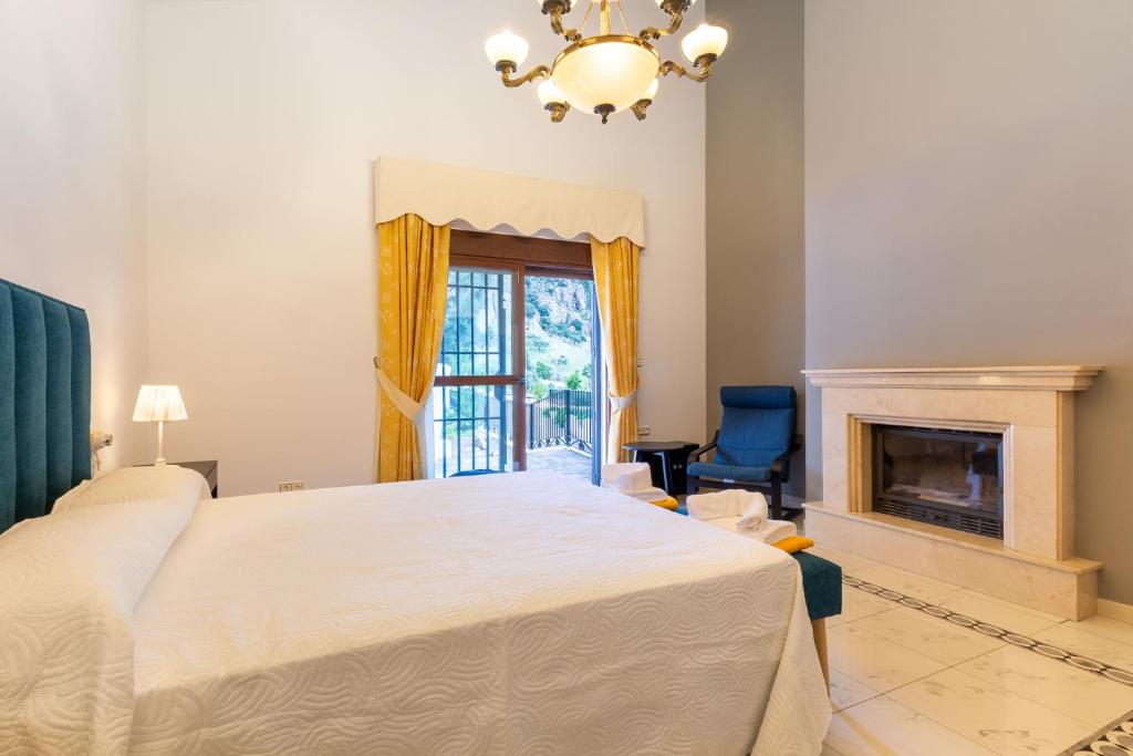 Posteľ alebo postele v izbe v ubytovaní Finca Puerto Ermita - Cerca Málaga 20KM - Pizarra