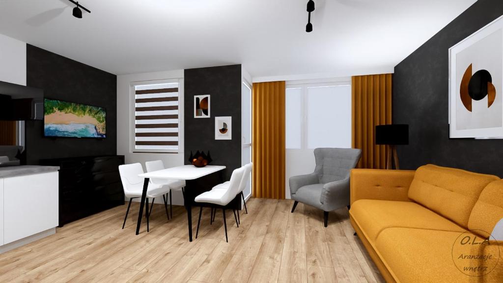 sala de estar con sofá, mesa y sillas en Apartamenty Balbina 1, en Tychy