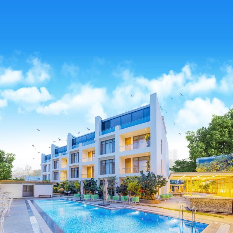 an image of a building with a swimming pool at ELLAA RESIDENCES in Hyderabad