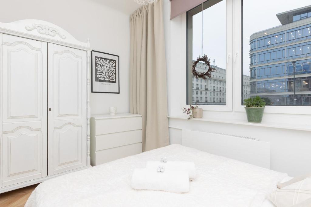 Posteľ alebo postele v izbe v ubytovaní CityCenter Fashionable Apartment Warsaw by Noclegi Renters
