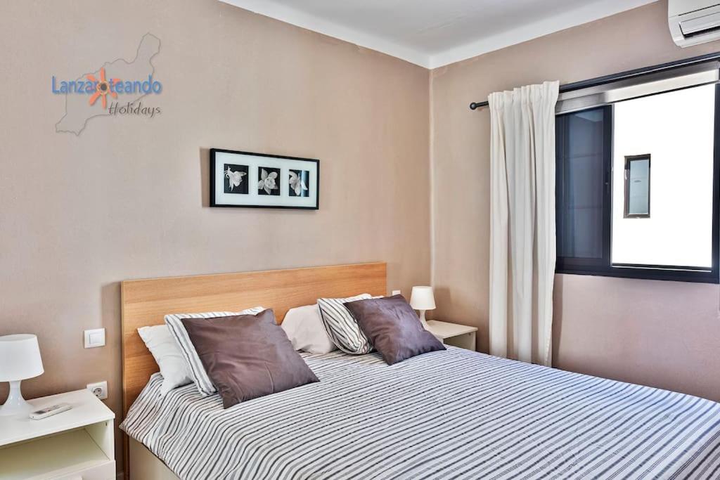 Postel nebo postele na pokoji v ubytování Vivienda Vacacional Manrique