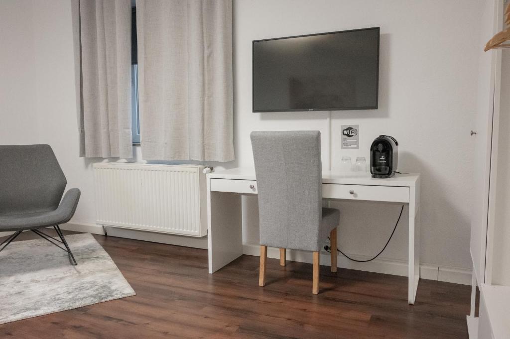 TV a/nebo společenská místnost v ubytování Hotel Teatro