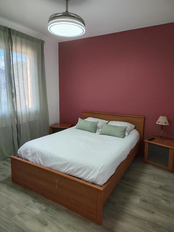 Letto o letti in una camera di LE SPORTING