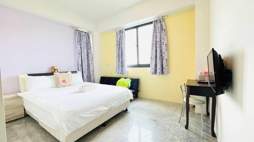 TV a/nebo společenská místnost v ubytování Miss Chang's B&B