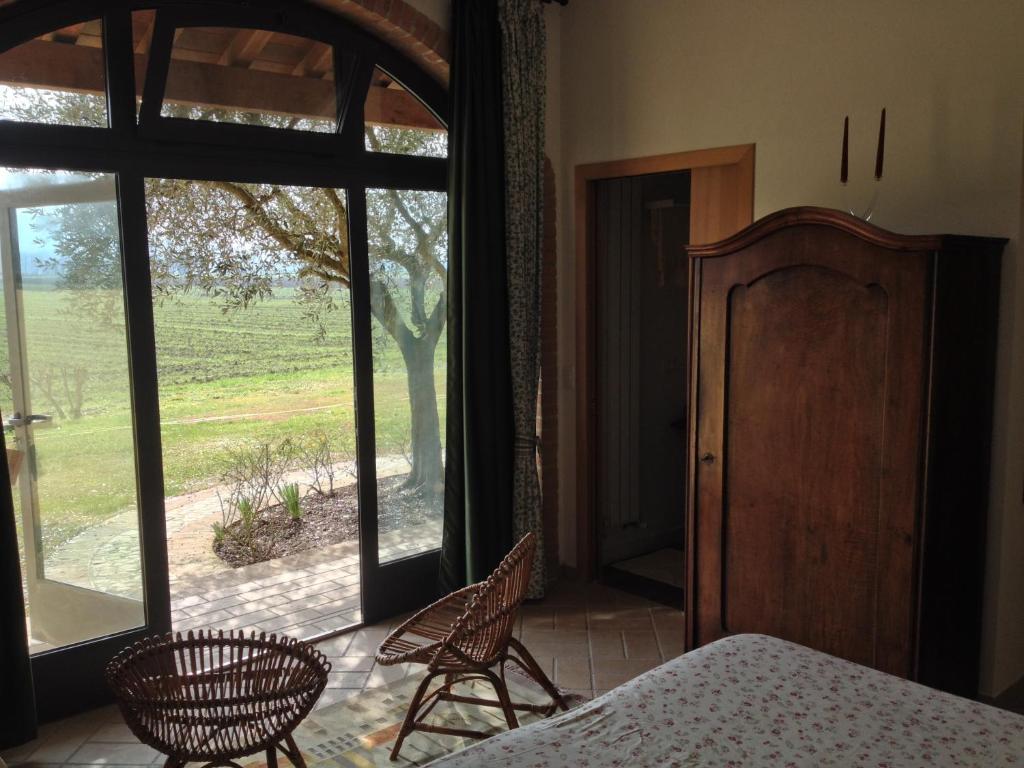 A bed or beds in a room at Agriturismo Borgo Laurice