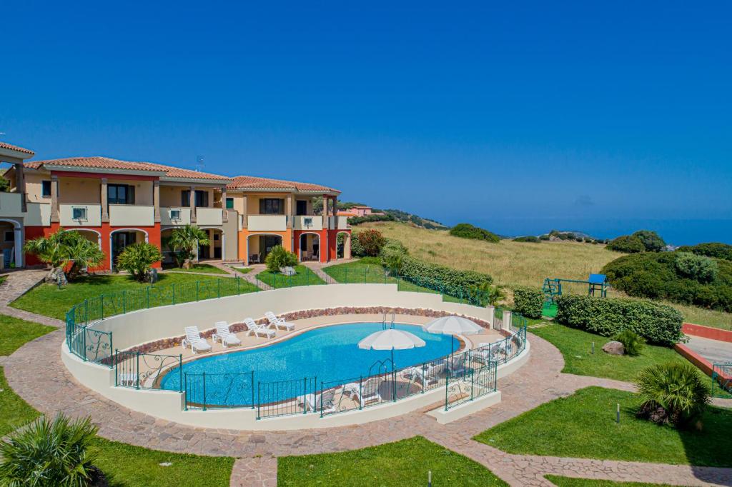 A view of the pool at Residenza Le Farfalle or nearby