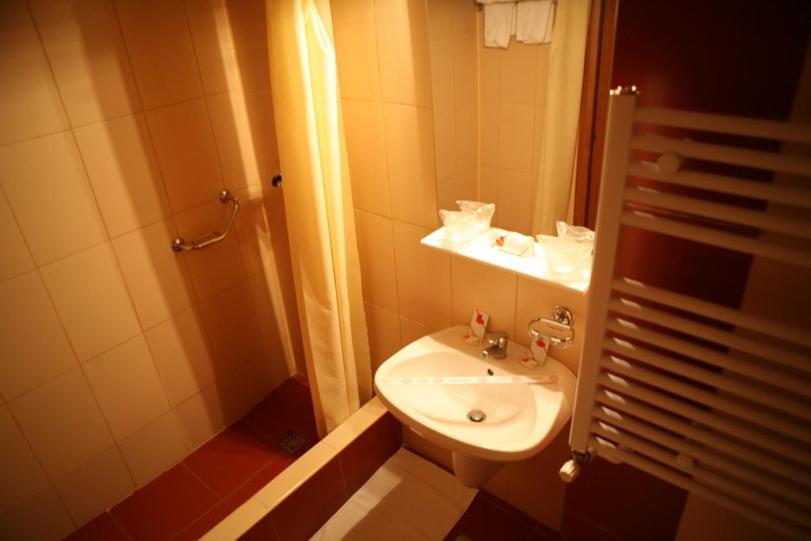 Koupelna v ubytování Hotel Paradiso