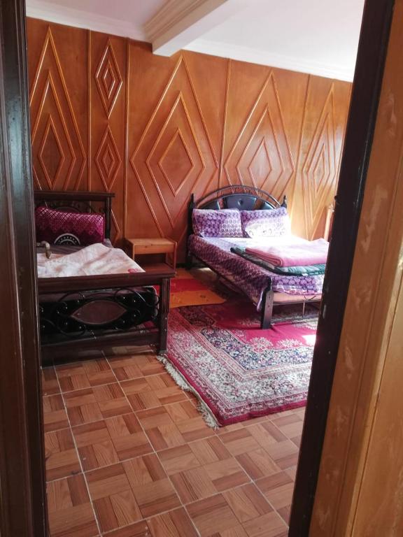 Postel nebo postele na pokoji v ubytování Gite Oukaimeden