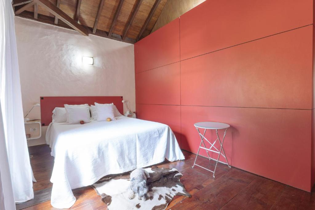 Postel nebo postele na pokoji v ubytování Hotel Rural Las Calas