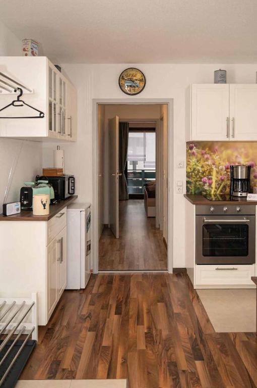 Kuchyň nebo kuchyňský kout v ubytování Ferienwohnung Winklworld inklusive aktivCARD
