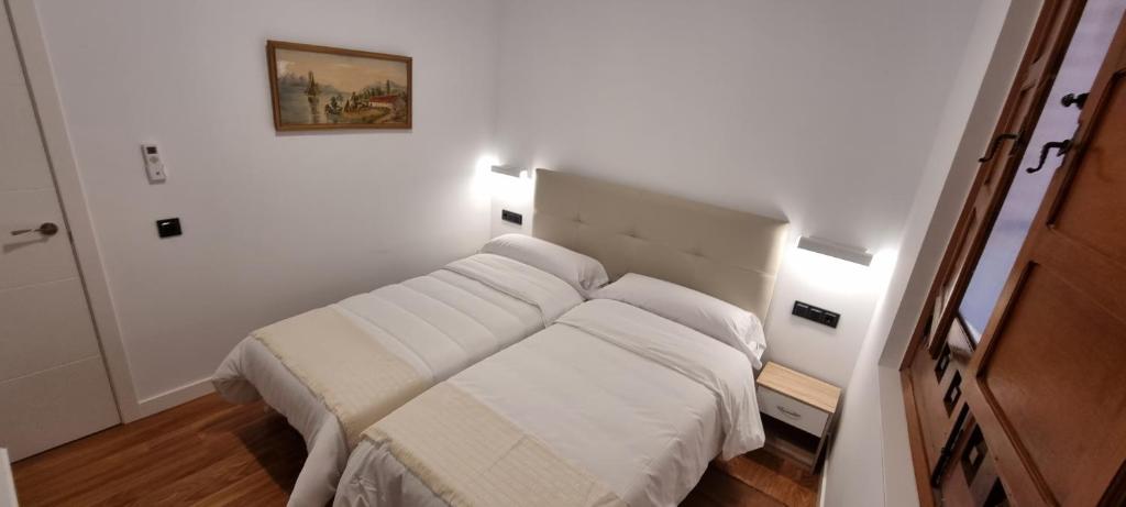 Postel nebo postele na pokoji v ubytování Atrium Toledo