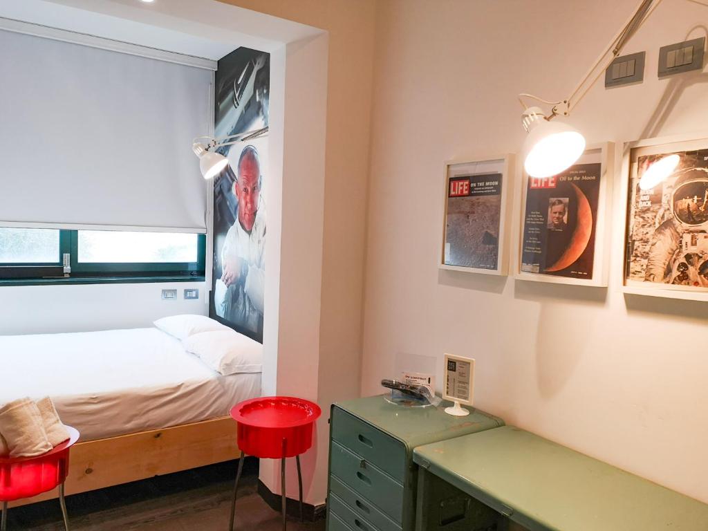 Postel nebo postele na pokoji v ubytování Hotel Perla - The storyhoteller