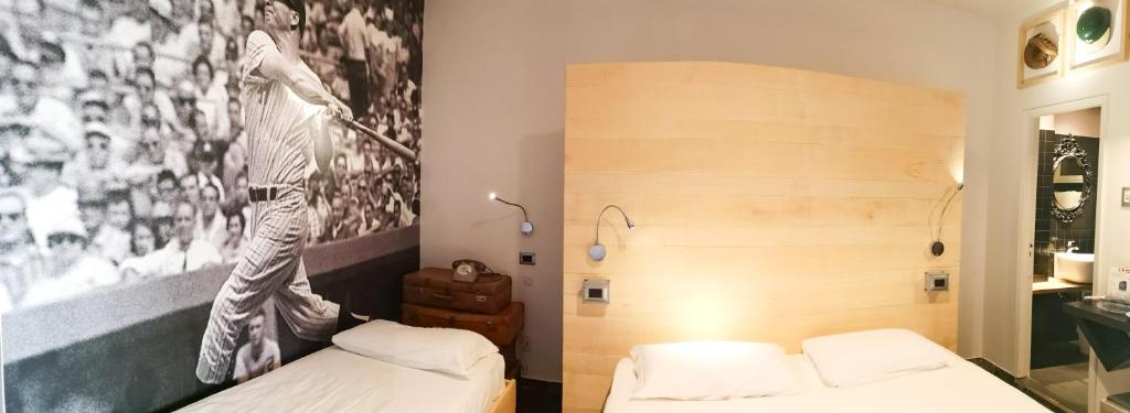 Postel nebo postele na pokoji v ubytování Hotel Perla - The storyhoteller