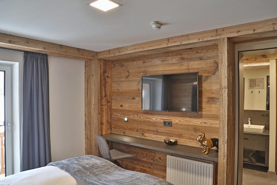 TV a/nebo společenská místnost v ubytování Sieglhub Chalets - Appartements - Hotel