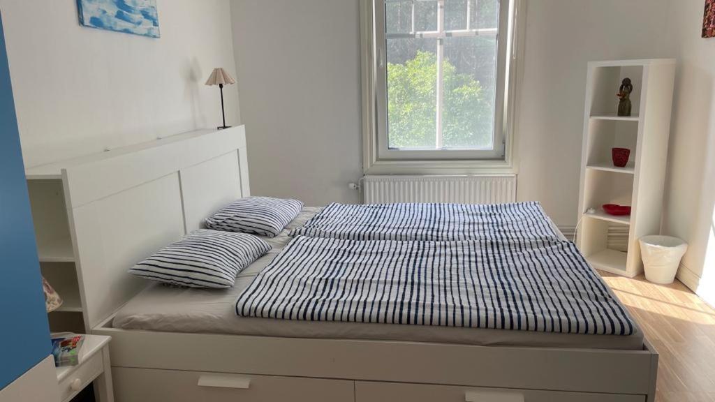 Postel nebo postele na pokoji v ubytování Manus Ferienwohnung