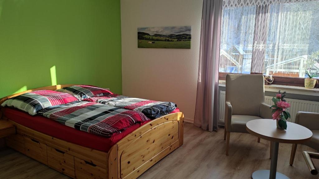 Postel nebo postele na pokoji v ubytování FeWo Eschert