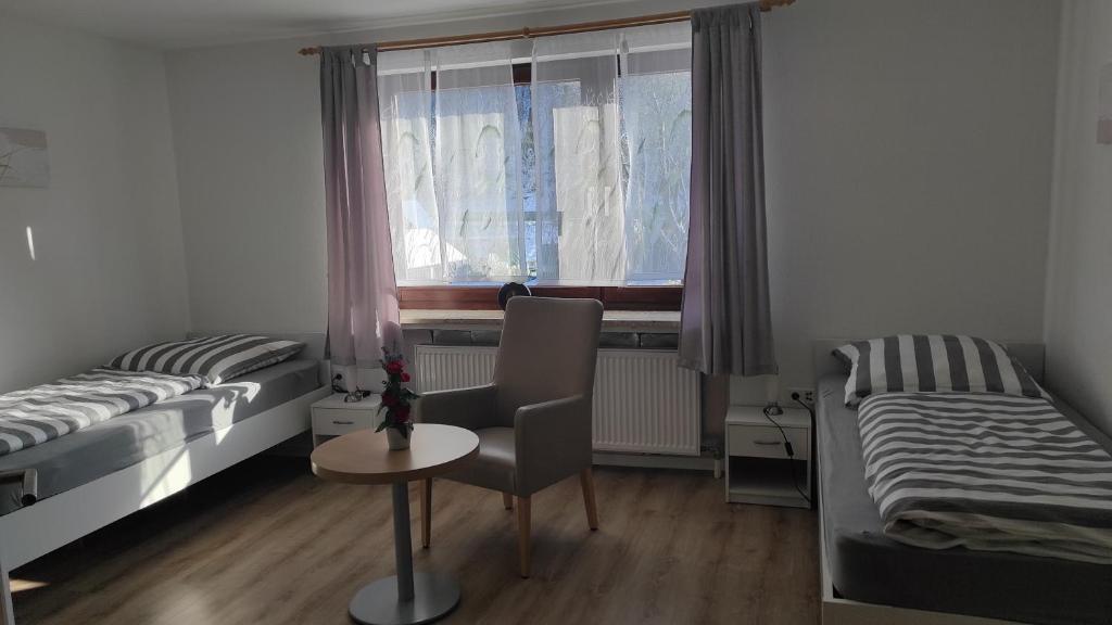 Postel nebo postele na pokoji v ubytování FeWo Eschert