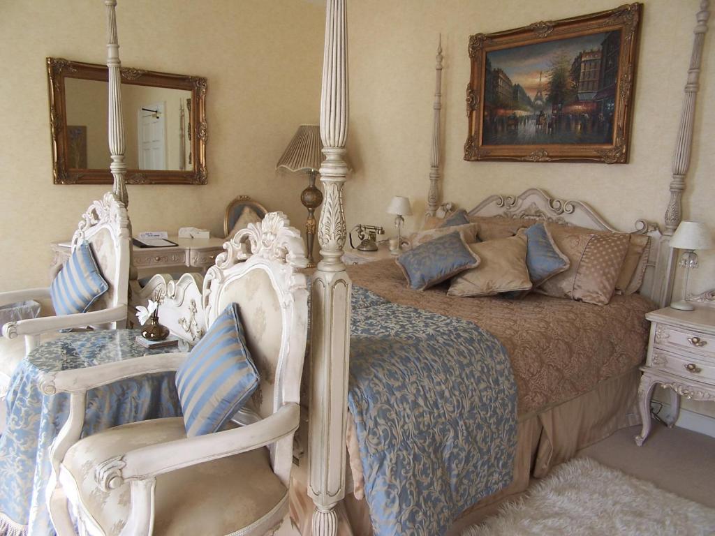 Postel nebo postele na pokoji v ubytování La Haule Manor