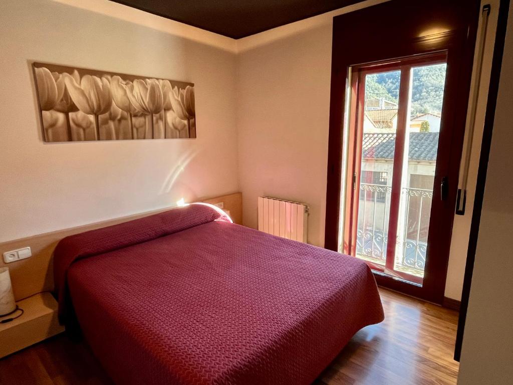Posteľ alebo postele v izbe v ubytovaní Can Morera Apartaments a Les Preses